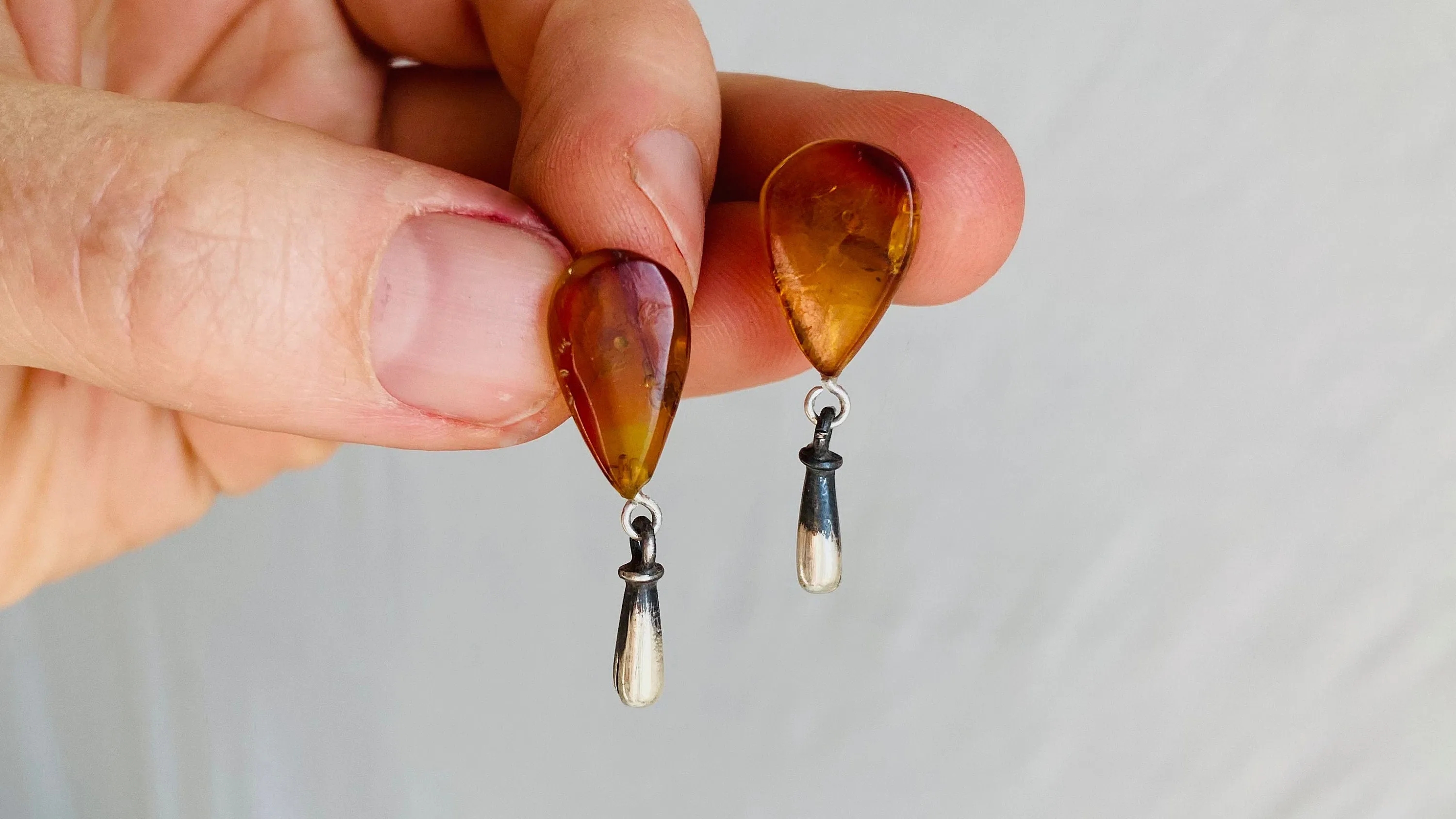 Red Amber Earrings. Monte Alban Reproduction Bells. Sterling Silver.